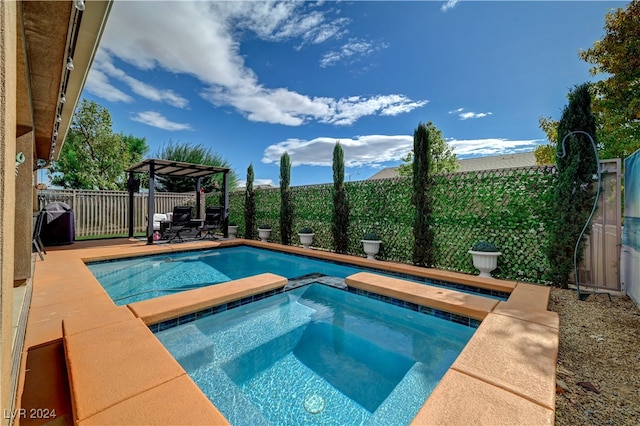 view of pool featuring a pergola, an in ground hot tub, and a patio area