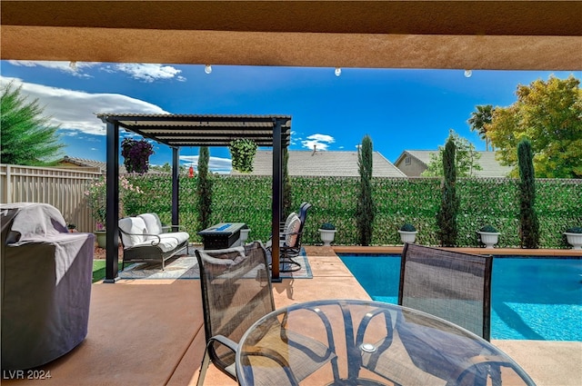 view of patio with a fenced in pool and outdoor lounge area