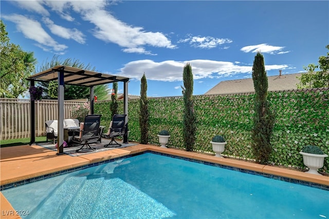 view of pool featuring a patio area and a pergola