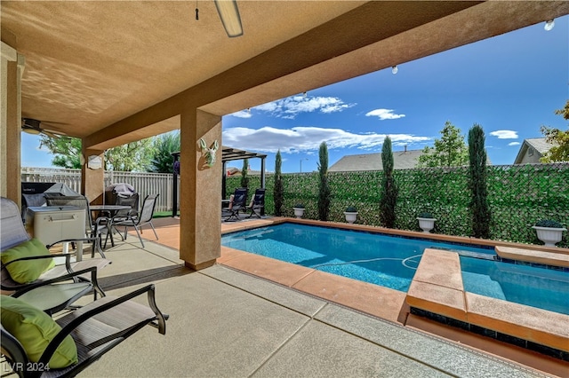 view of swimming pool featuring a patio area