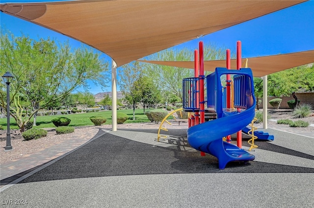 view of playground featuring a yard