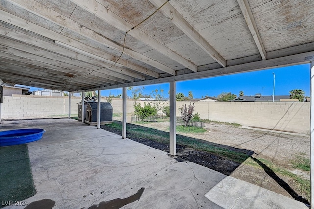 view of patio / terrace with a storage unit