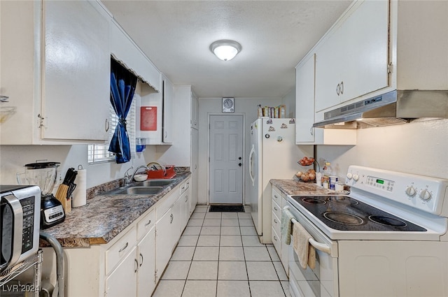 kitchen with white cabinetry, sink, and white appliances