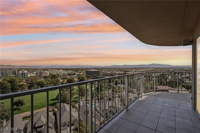 balcony at dusk with a mountain view