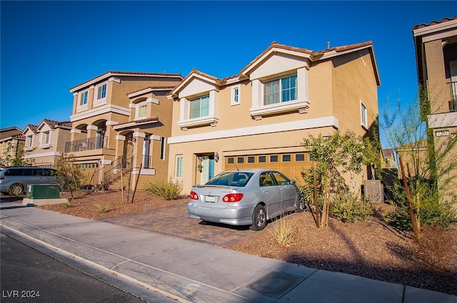 view of front of property with a garage