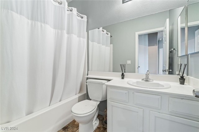 full bathroom featuring shower / bath combo, vanity, and toilet