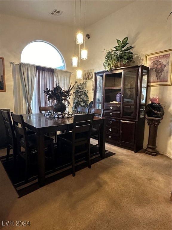 dining area with light carpet