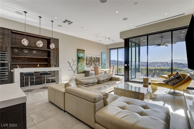 living room featuring ceiling fan