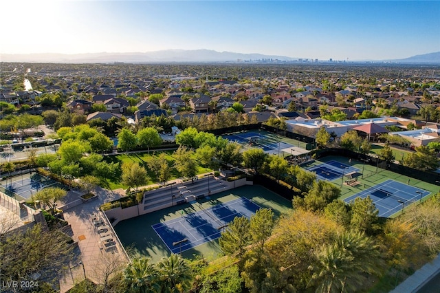 birds eye view of property with a mountain view