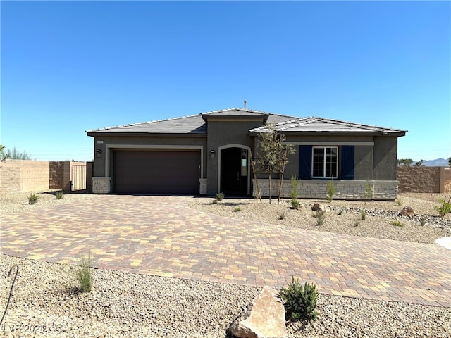 prairie-style home with a garage