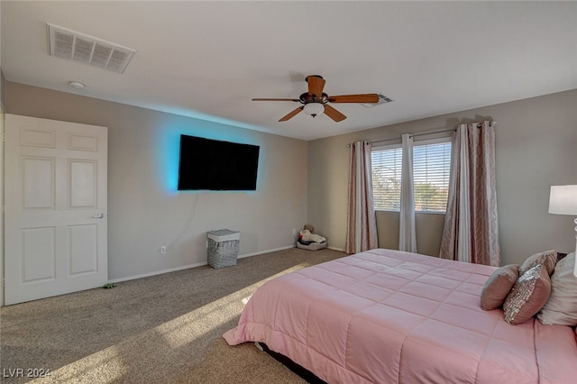 bedroom featuring ceiling fan and carpet flooring