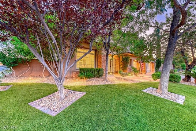 view of front of home with a front yard