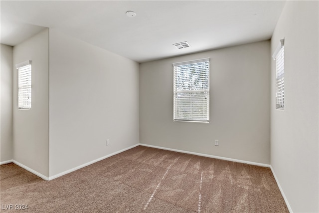 empty room with carpet floors