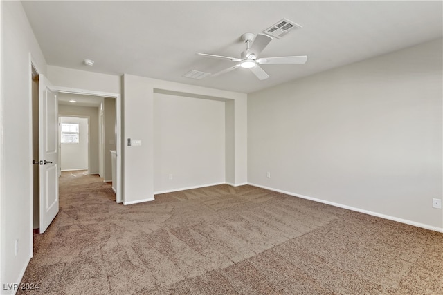 unfurnished bedroom with carpet floors and ceiling fan