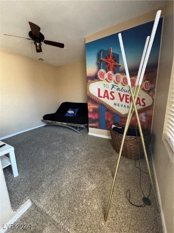 bedroom with carpet floors, ceiling fan, and baseboards