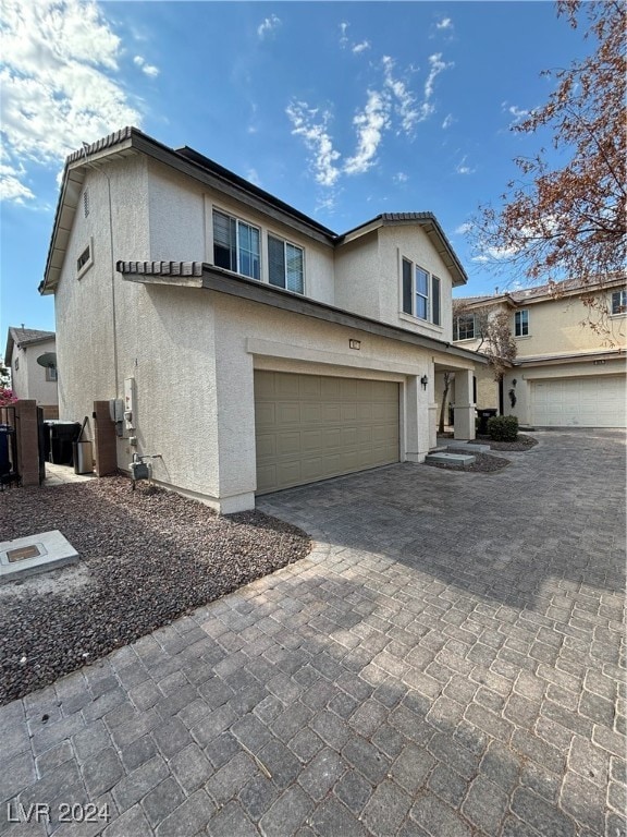 view of property featuring a garage