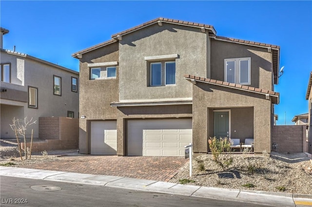 view of front of home featuring a garage