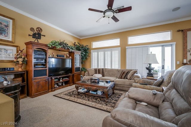 carpeted living room featuring crown molding and ceiling fan