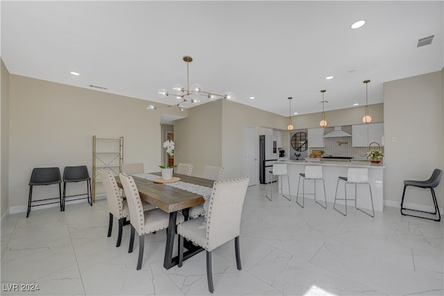 dining area with a chandelier