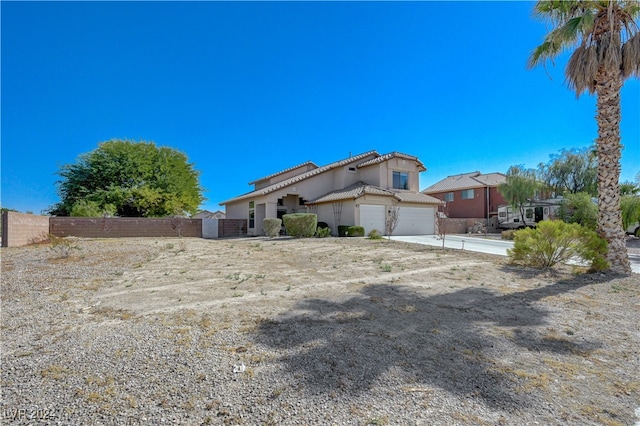 view of front of property with a garage