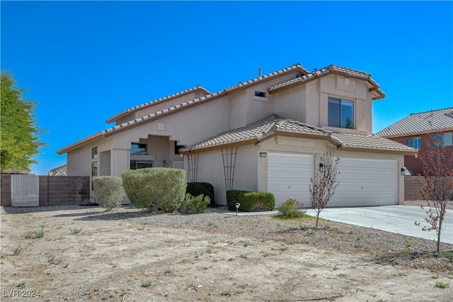 view of side of property featuring a garage