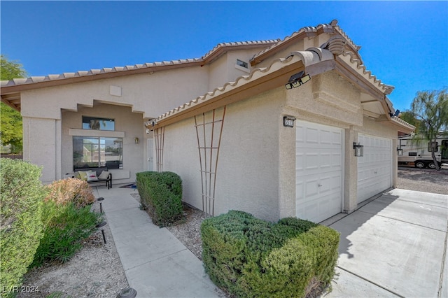 view of home's exterior featuring a garage