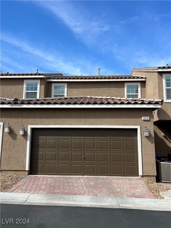 exterior space featuring central AC unit