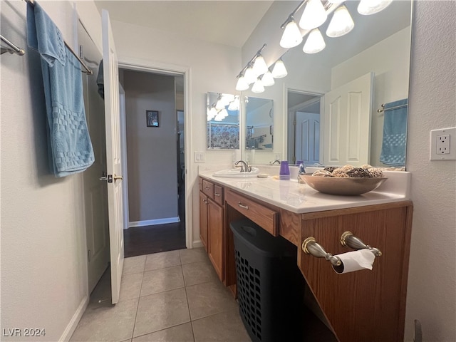 bathroom featuring tile patterned floors and vanity