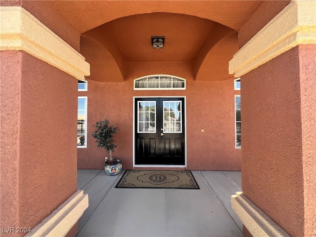 property entrance featuring french doors