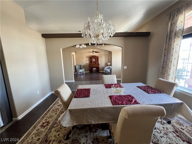 dining space featuring a notable chandelier