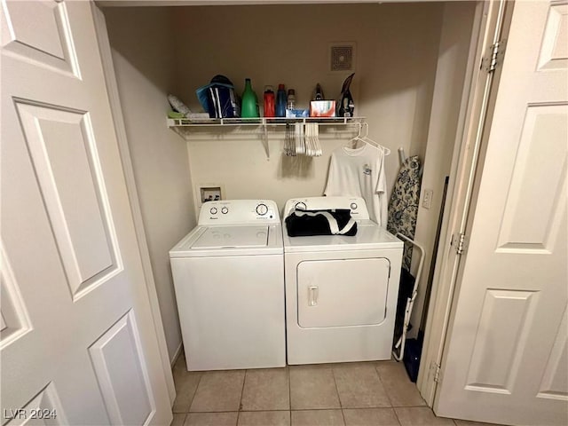 3550 Bay Sands Dr Unit 1085, Laughlin, NV 89029 - laundry room with independent washer and dryer and light tile patterned floors