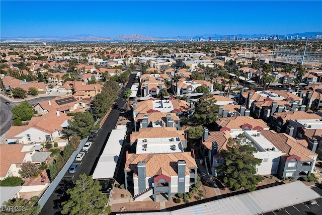 aerial view with a mountain view and a residential view