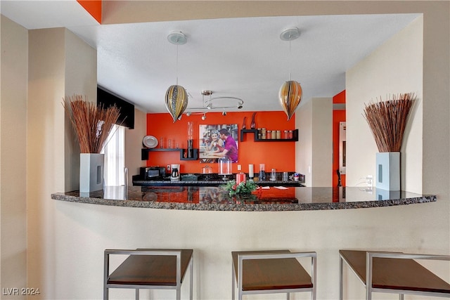 kitchen with dark stone counters