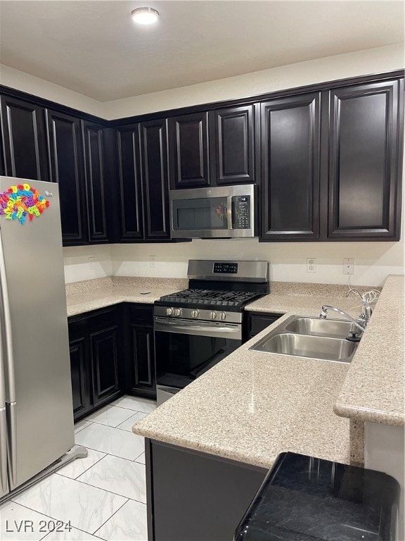 kitchen with stainless steel appliances and sink