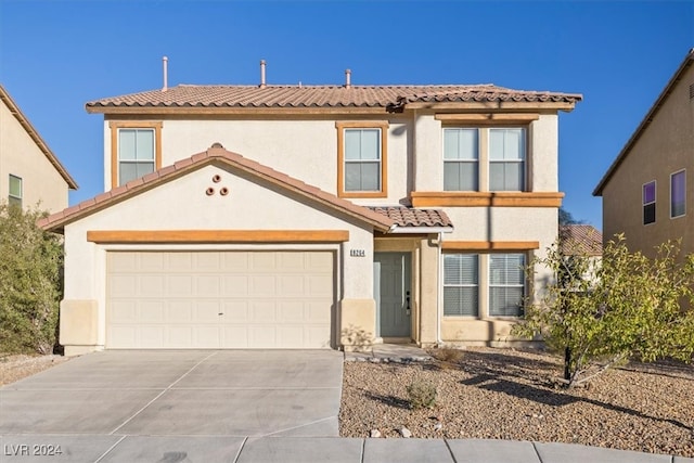 view of front of home with a garage