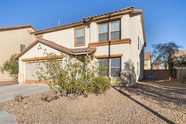 view of front of property with a garage