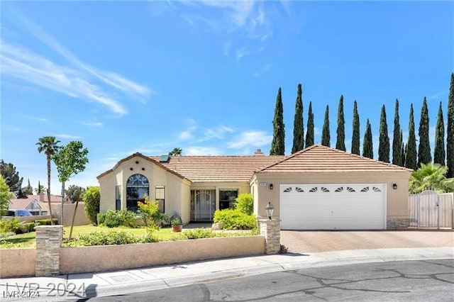 view of front of property with a garage