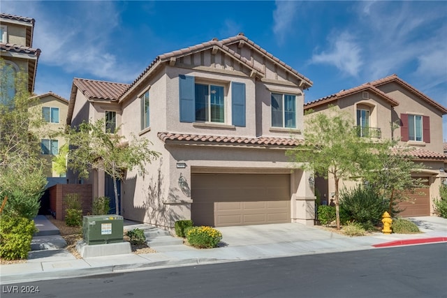 view of front of home with a garage