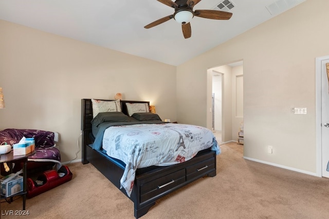 bedroom featuring ceiling fan, light colored carpet, and lofted ceiling