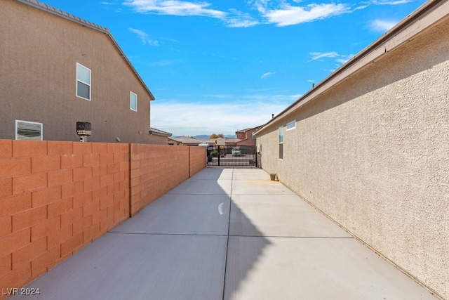 view of side of home with a patio area