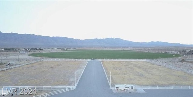 view of mountain feature with a rural view