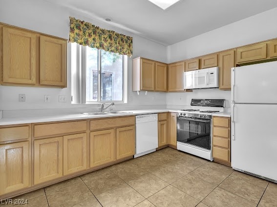 kitchen featuring light tile patterned flooring, white appliances, sink, and light brown cabinets