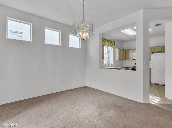 interior space featuring a notable chandelier and a healthy amount of sunlight