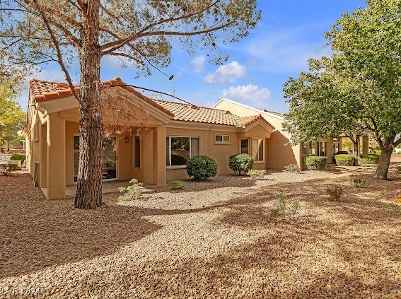 rear view of house featuring a patio area