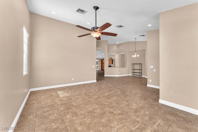 3689 Callahan Ave, Las Vegas, NV 89120 - unfurnished living room with ceiling fan, baseboards, high vaulted ceiling, and recessed lighting