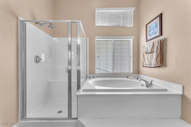 3689 Callahan Ave, Las Vegas, NV 89120 - bathroom with a stall shower and a bath