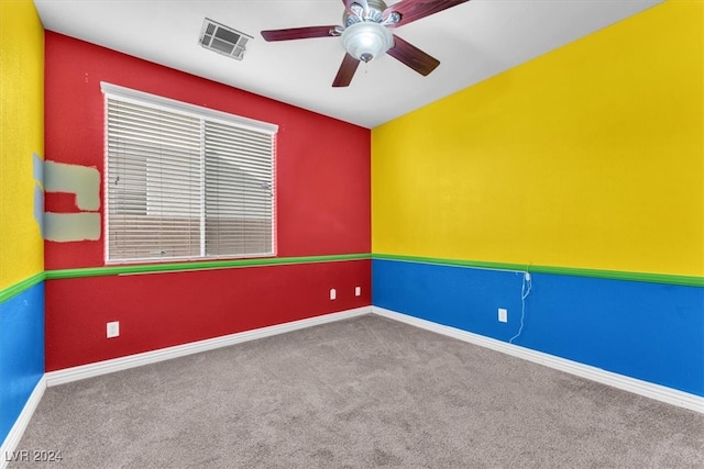 carpeted empty room with ceiling fan