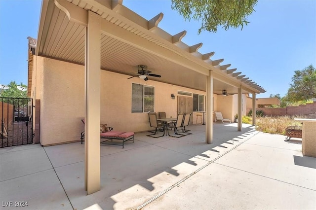 3689 Callahan Ave, Las Vegas, NV 89120 - view of patio / terrace with ceiling fan, outdoor dining area, and fence