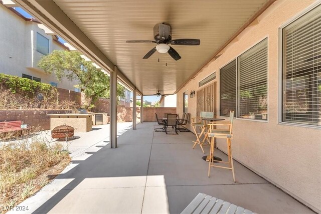 3689 Callahan Ave, Las Vegas, NV 89120 - view of patio with outdoor dining space, fence, ceiling fan, and area for grilling