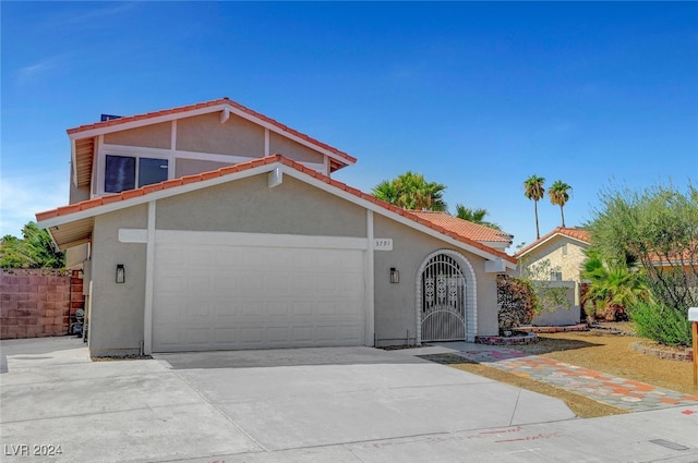 view of front of property with a garage